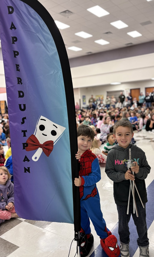 students with dapper dustpan flag 