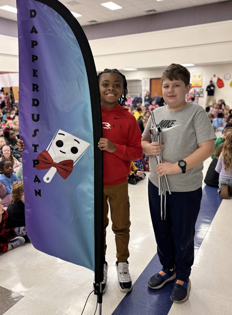 students with dapper dustpan flag 