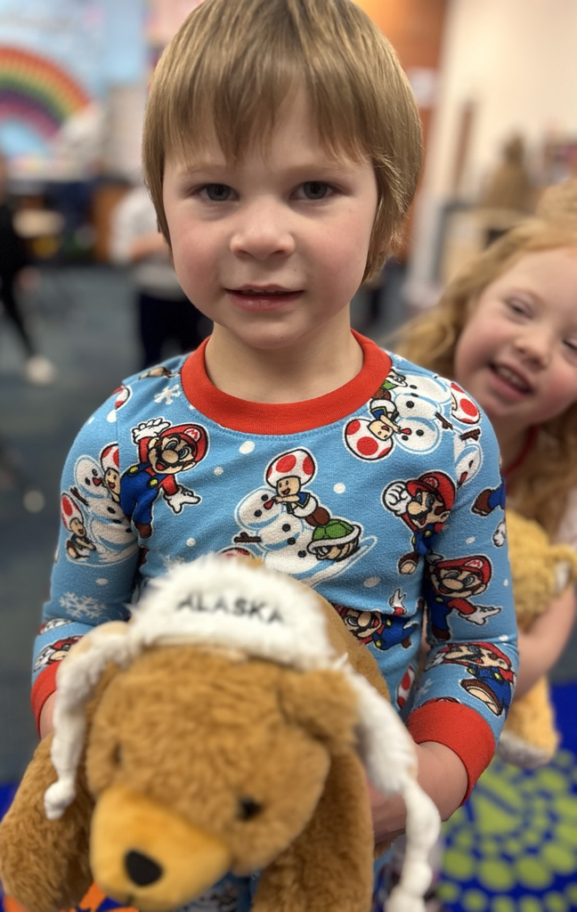 student with teddy bear 