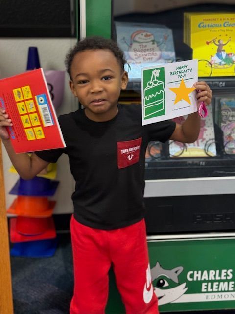 Student chooses book from vending machine