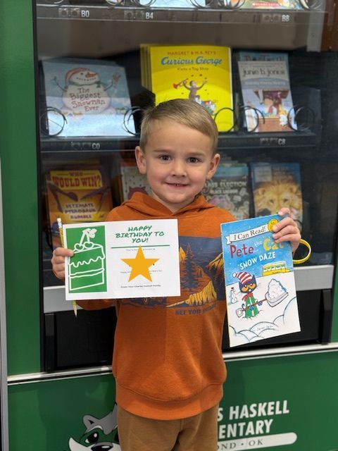 Student chooses book from vending machine