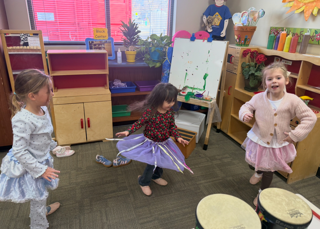 Students dancing in their Pretend Center