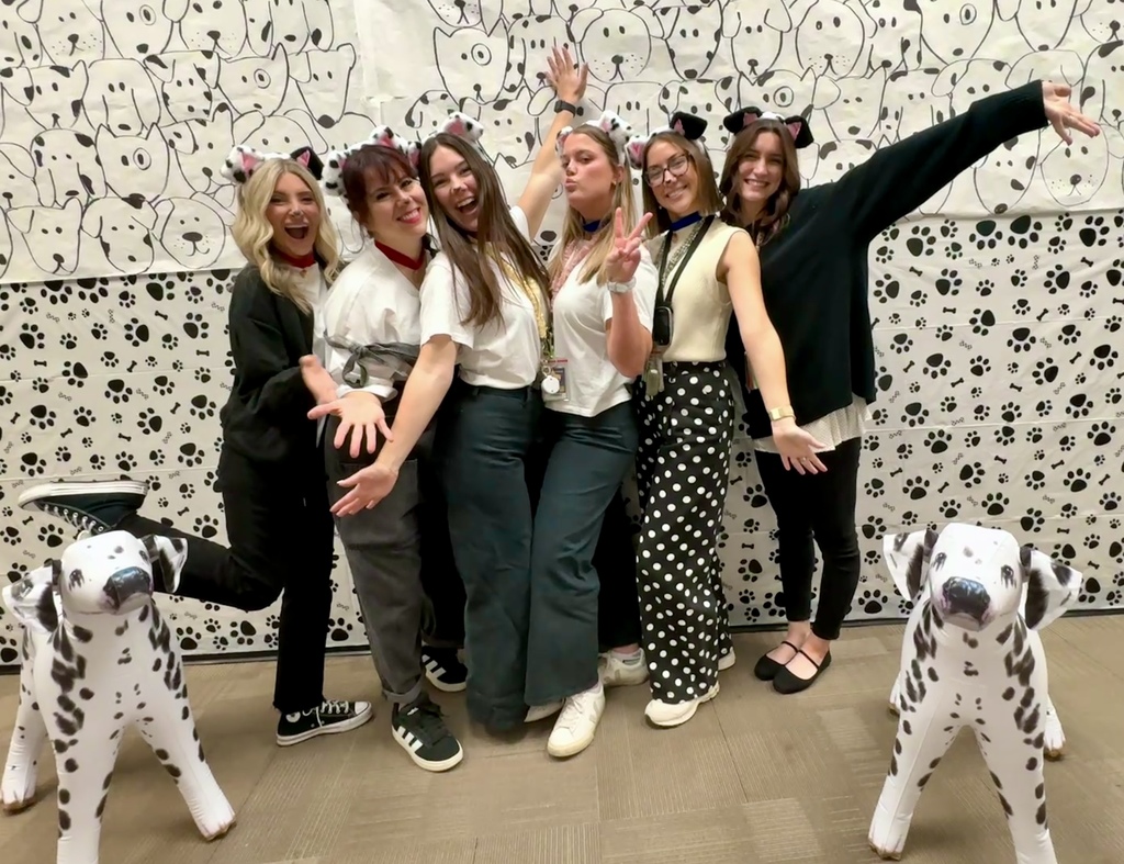 Teachers dressed like dalmations on 101st day