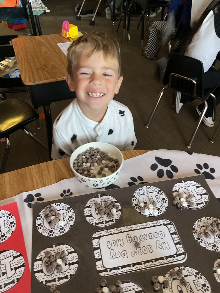 Student working on 101st day counting mat