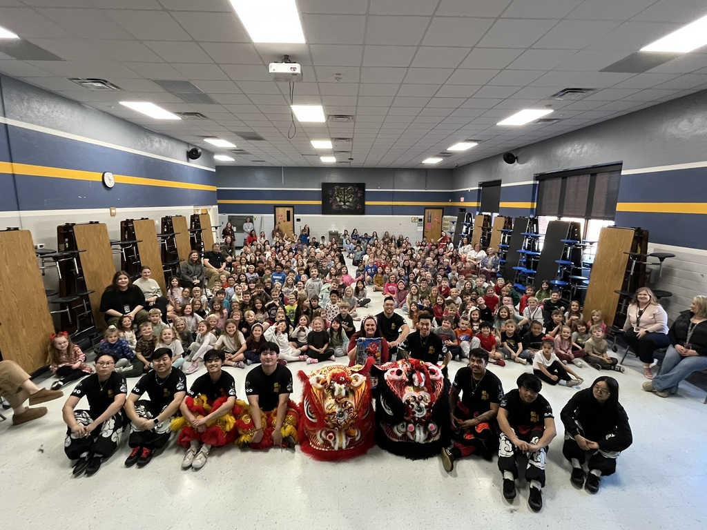 Lion Dancers troupe and the student body at the Lunar New Year Assembly