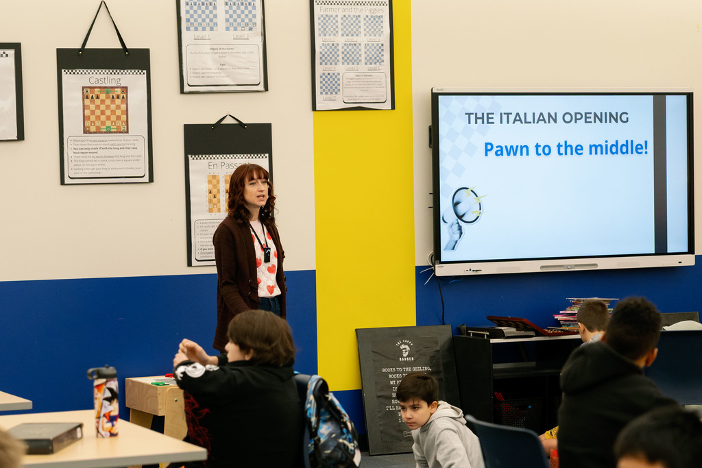 teacher teaching chess