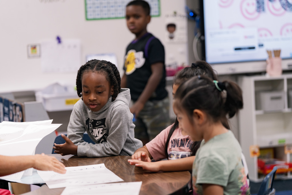 students listening to their teacher