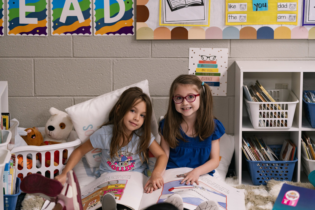 girls reading a book