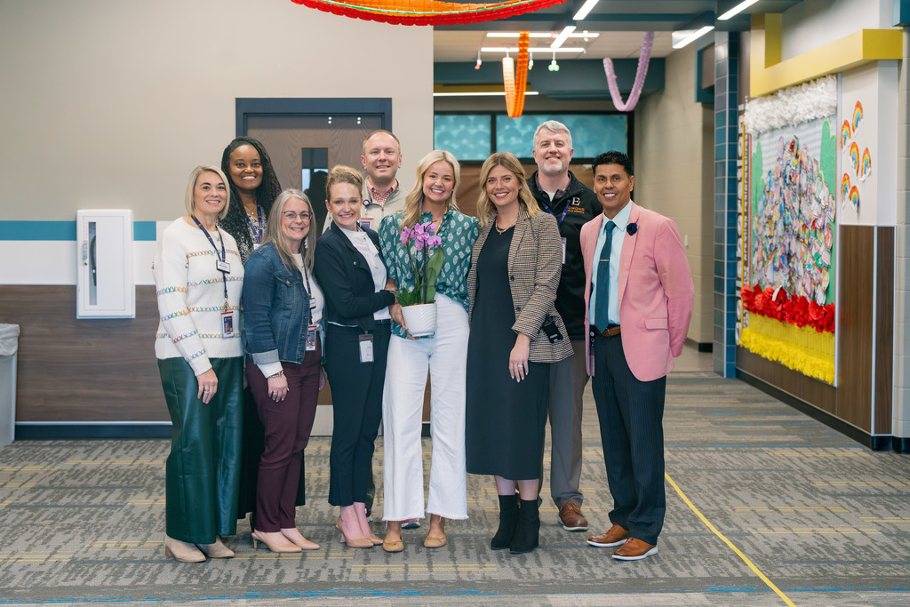 emma reid standing with administrators