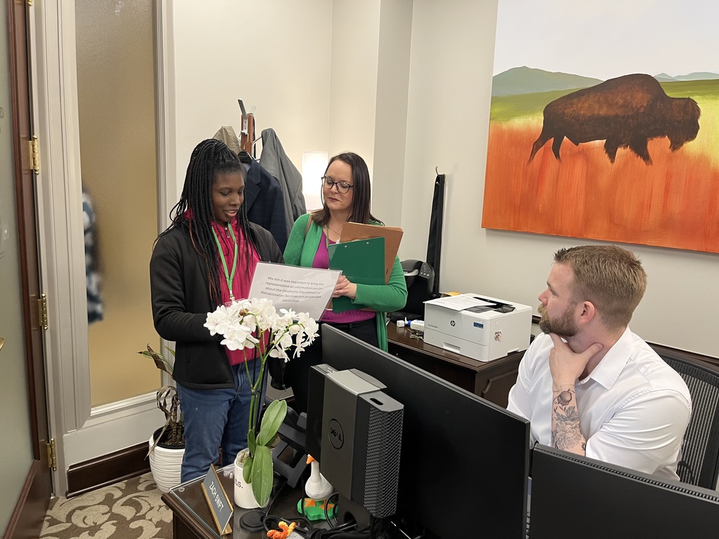 Intern talking to DRS and office staff