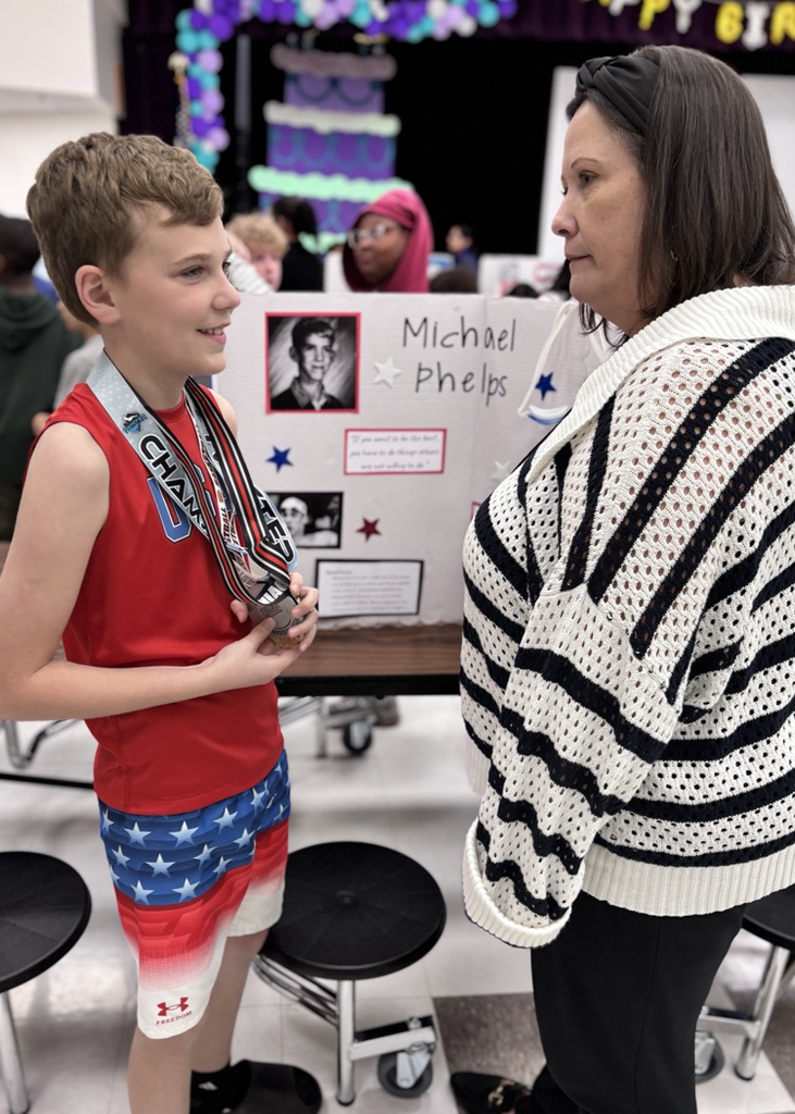 student presenting as Michael Phelps 