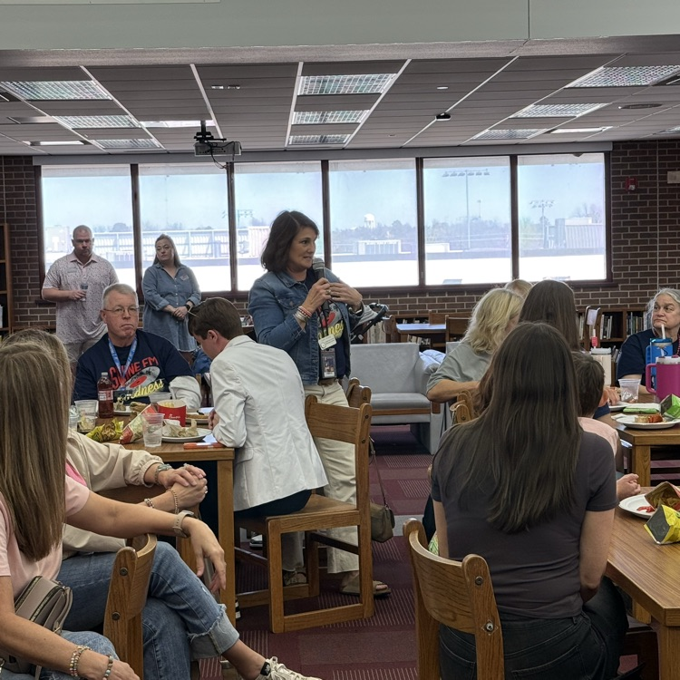 Cara hogan class of 86 speaking about swine week 
