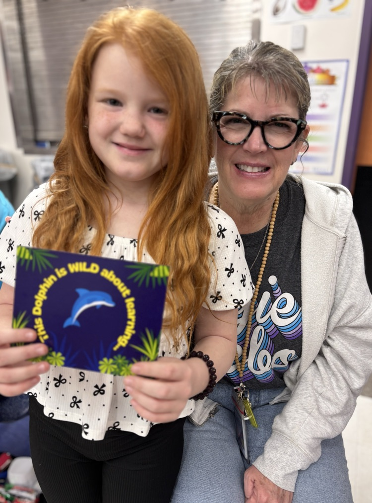 student receiving postcard from teacher 