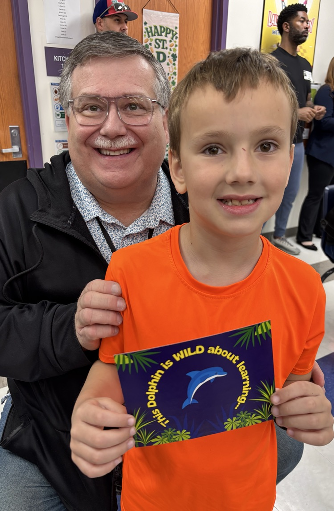 student receiving postcard from teacher 