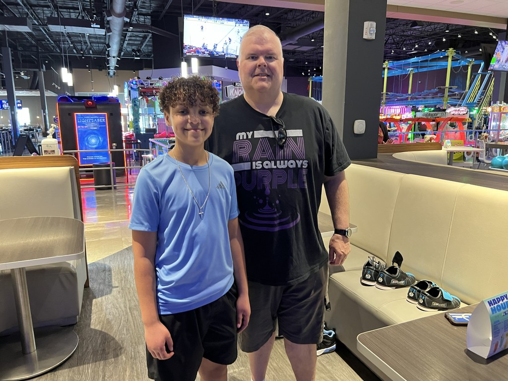 Jona Medina and his Social Studies techer Dwight Justice at Main Event!