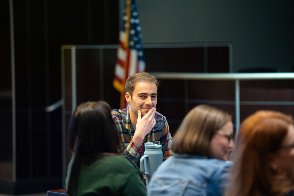 man candidly smiling