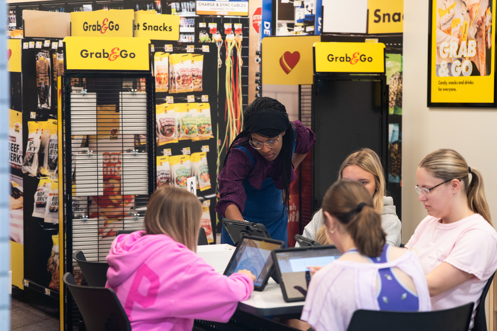students working on an ipad