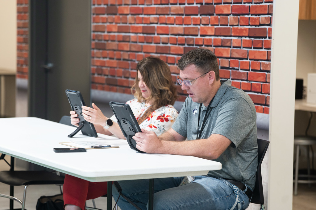 teachers working on ipads