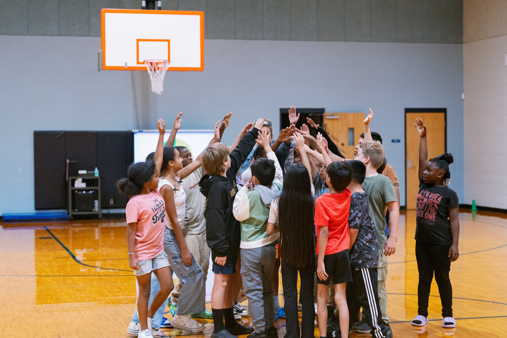 students cheering in pe class