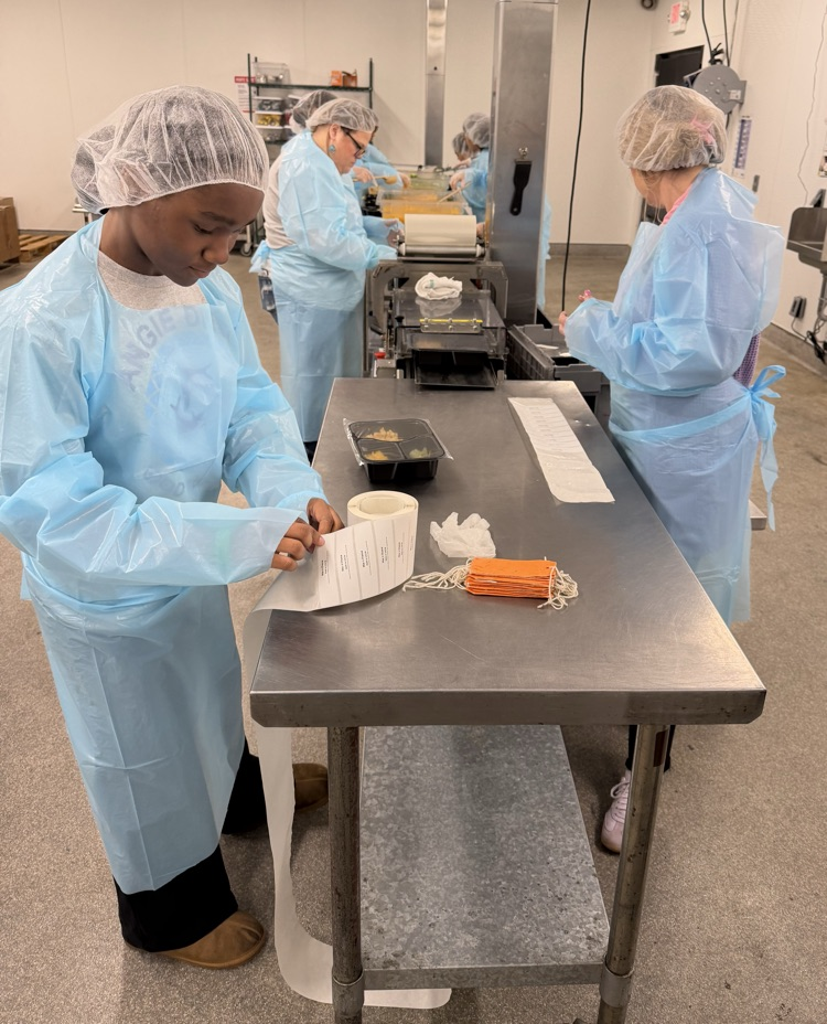 students at food bank