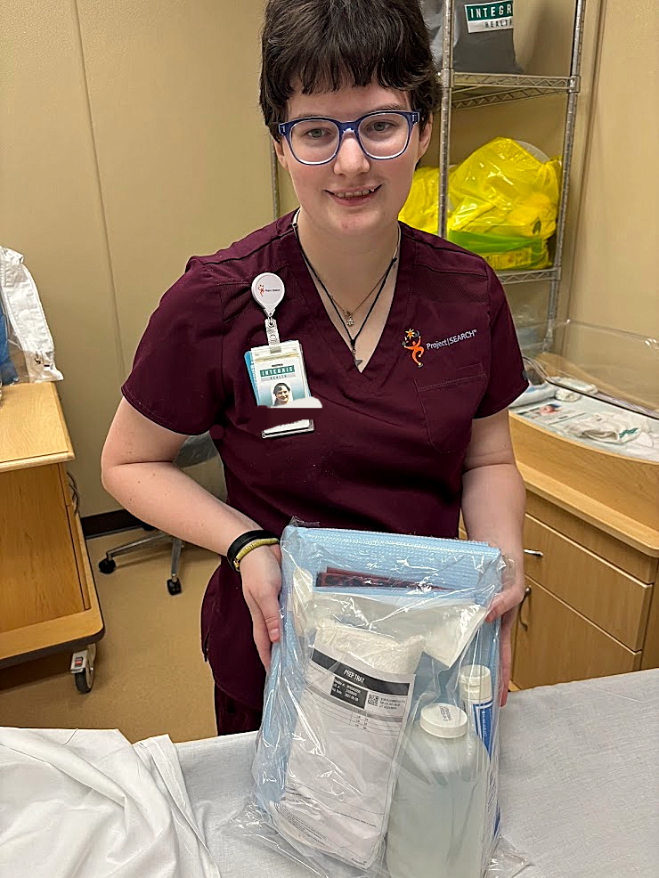 An intern creating care kits