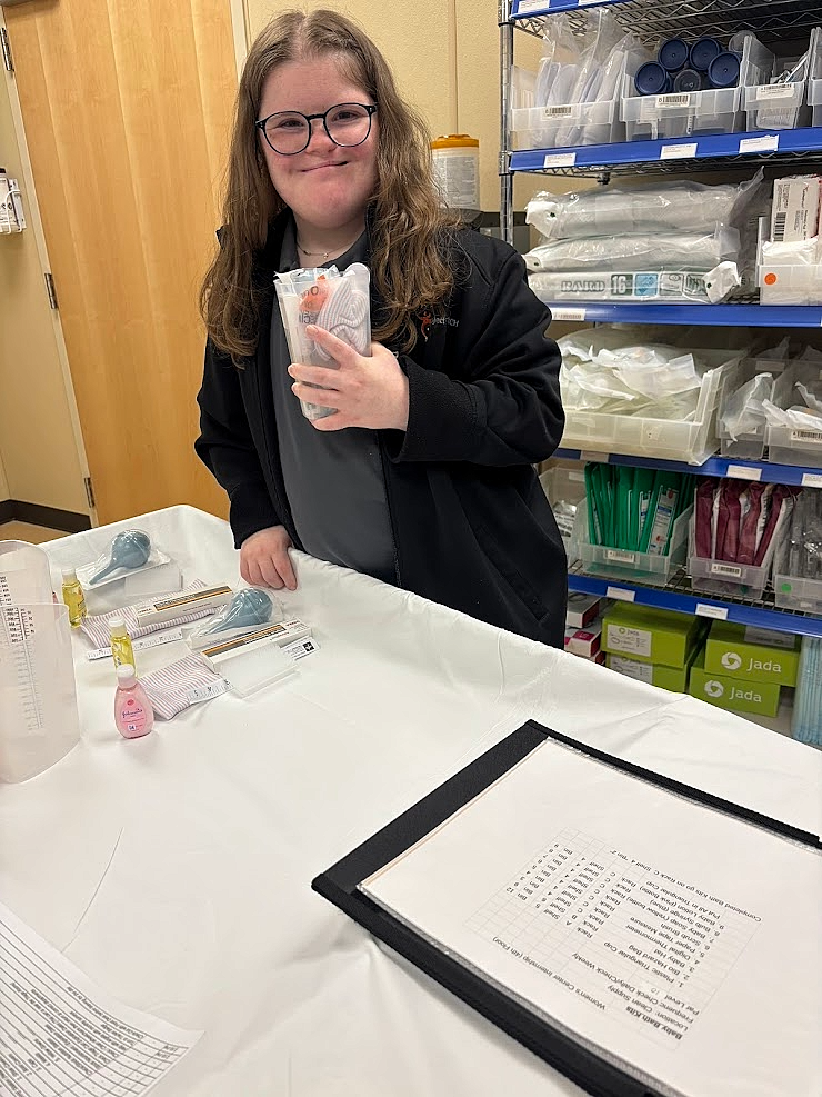 An intern creating care kits