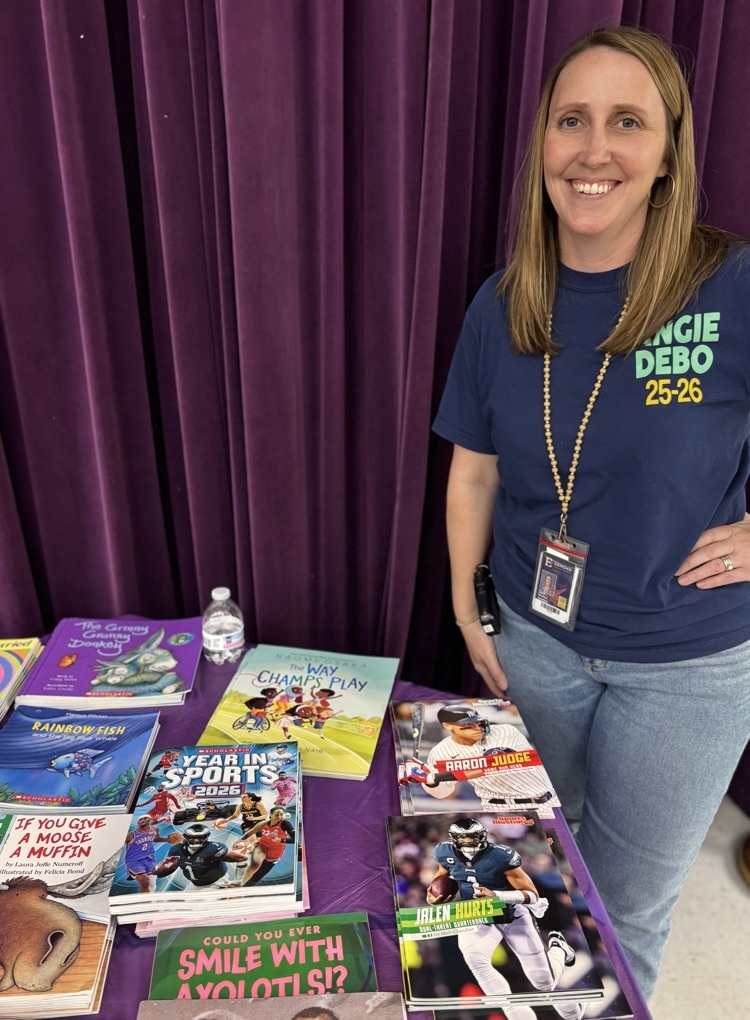 Mrs Delpha with her prize table 