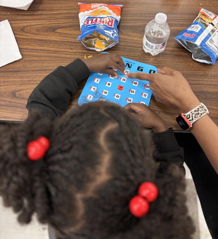 student and parent playing bingo 