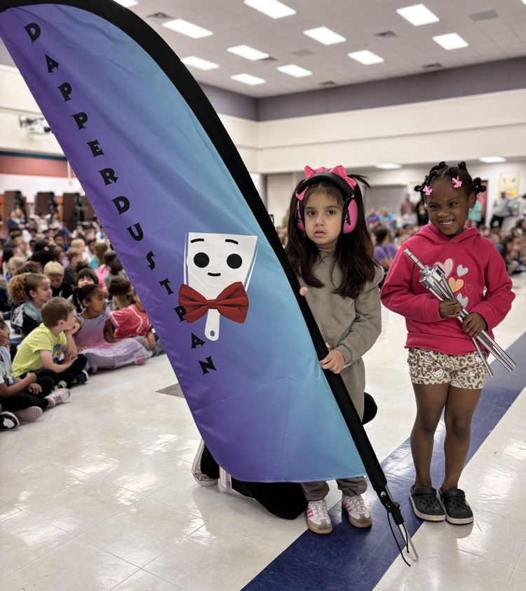 students holding award flag