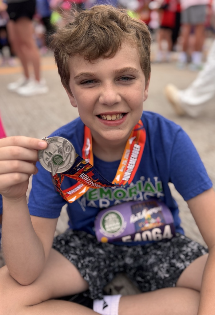 student with medal 
