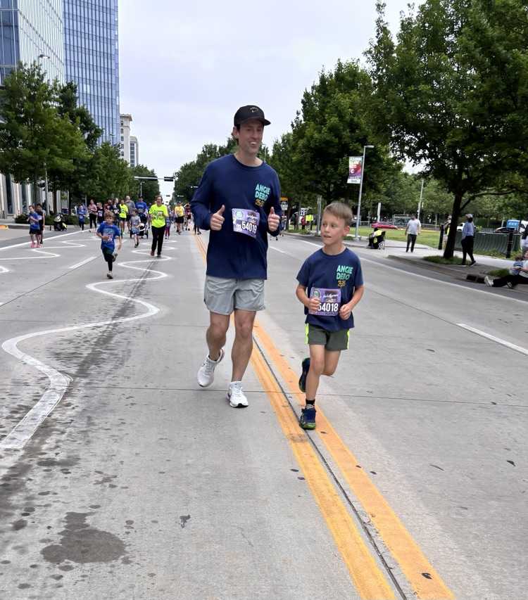 student running with parent 
