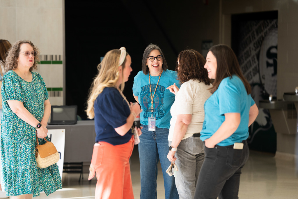 adults talking in a group