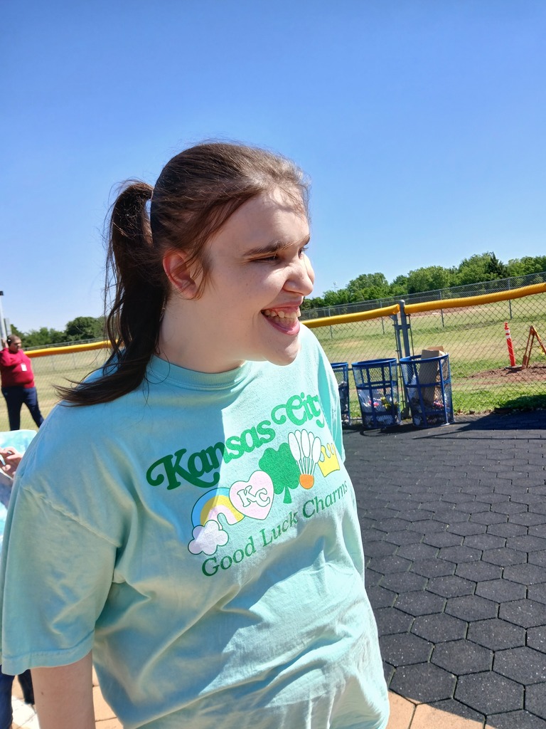 An intern playing kickball.