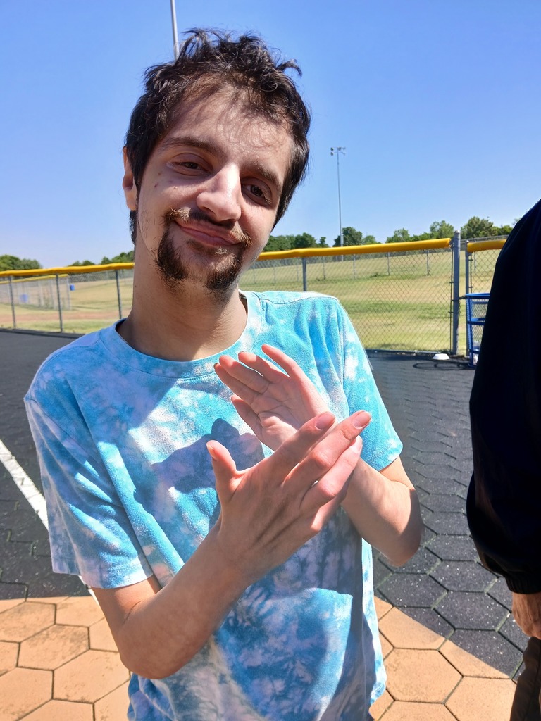 An intern playing kickball.