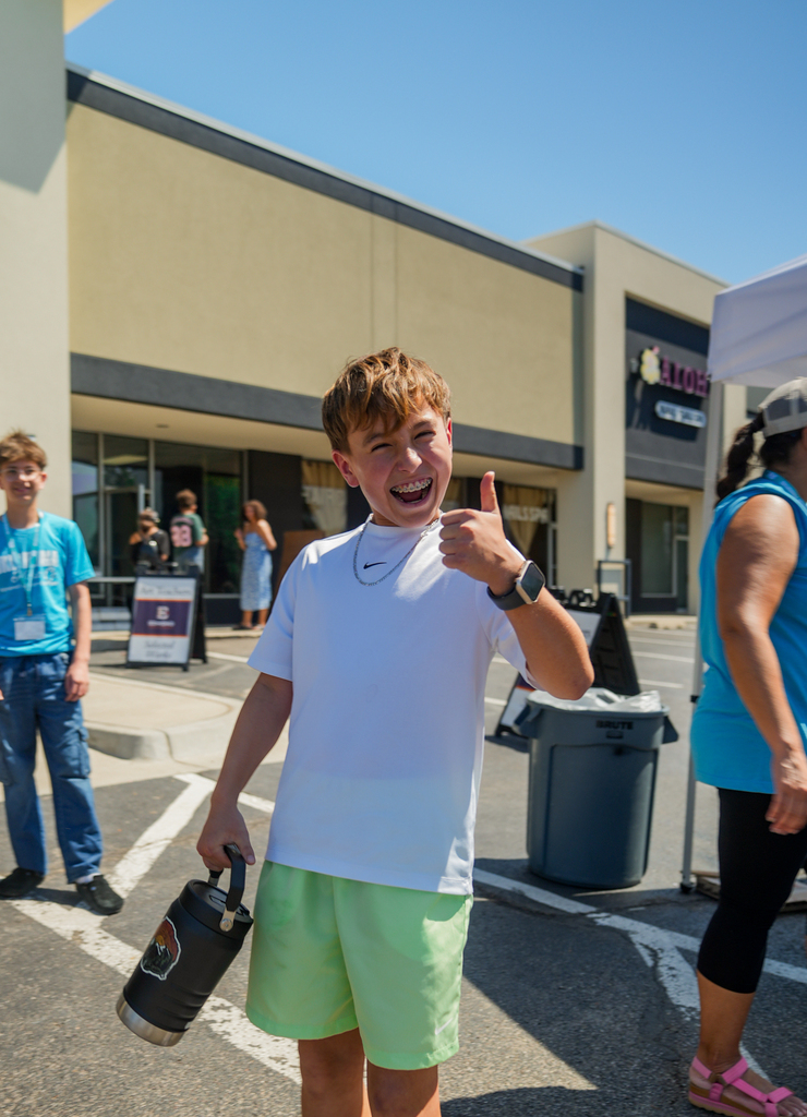 student giving a thumbs up