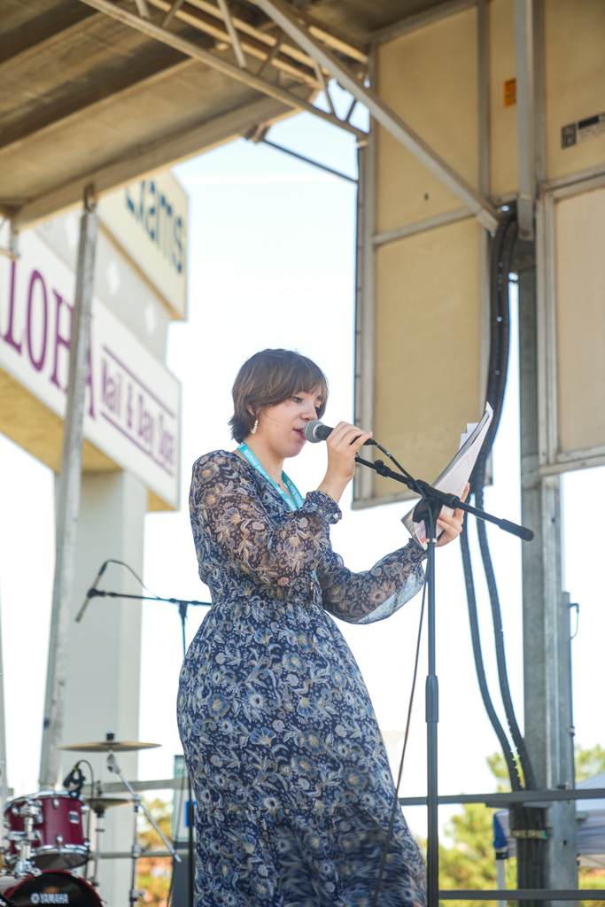 student singing on stage