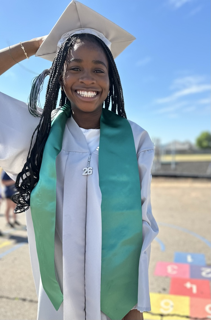 senior holding her graduation cap 