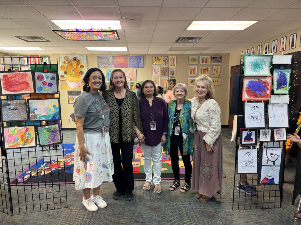 teachers smiling and posing