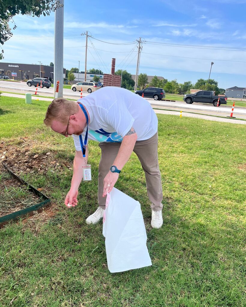 administrators doing acts of kindness around edmond