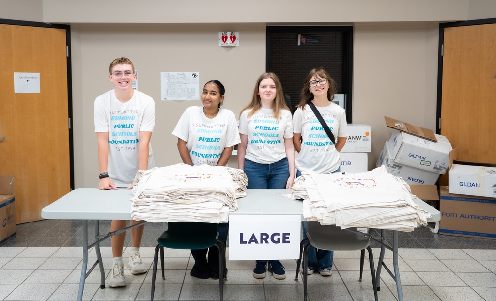 students distributing shirts
