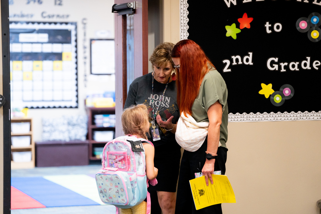 teacher and student talking