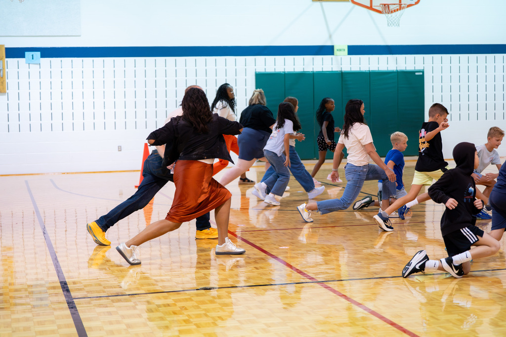 administrators and students lunging