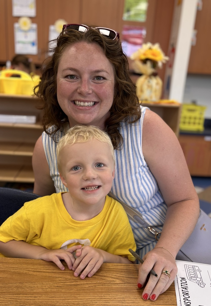student and parent smiling 