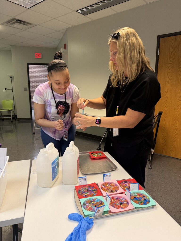 An intern and teacher making picky pads