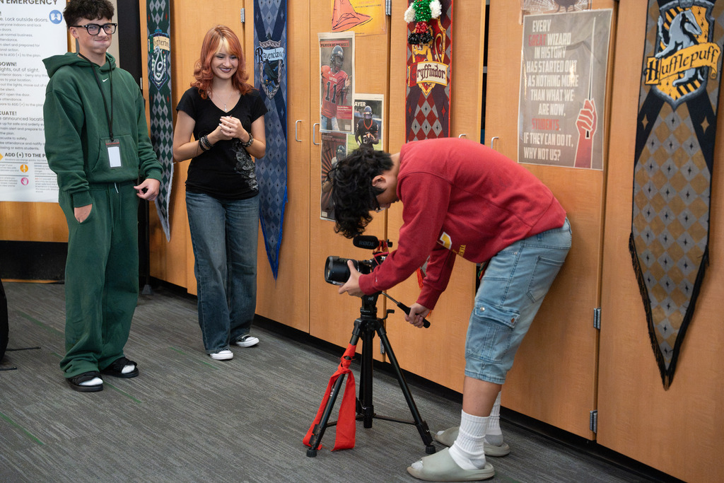 students filming 