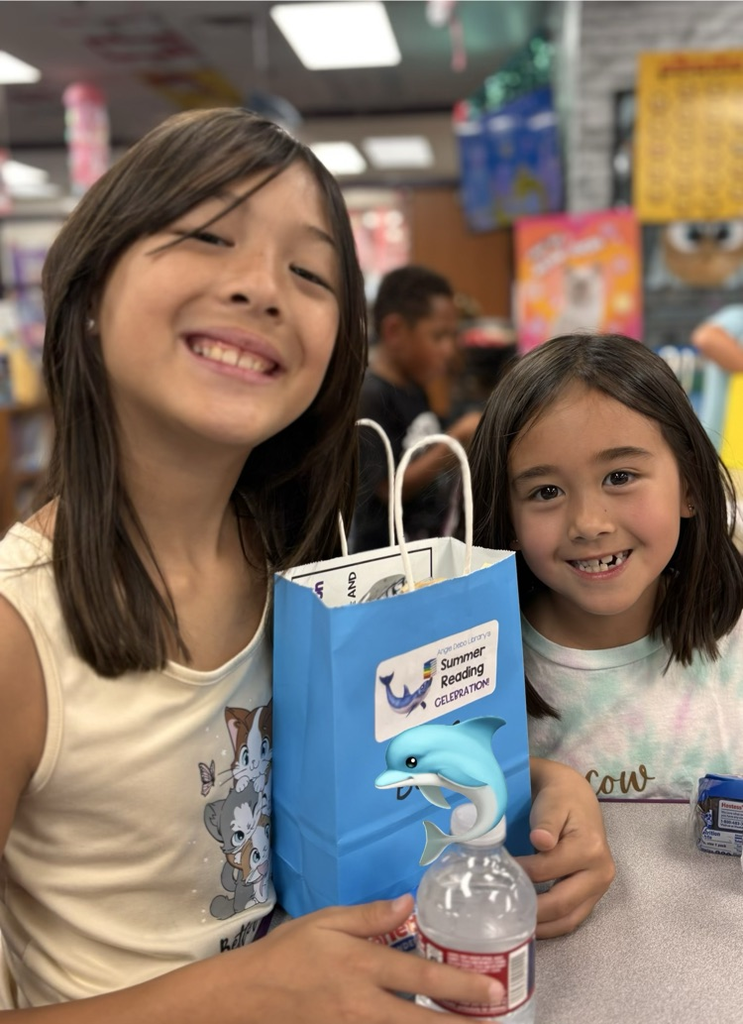 siblings at summer reading celebration 