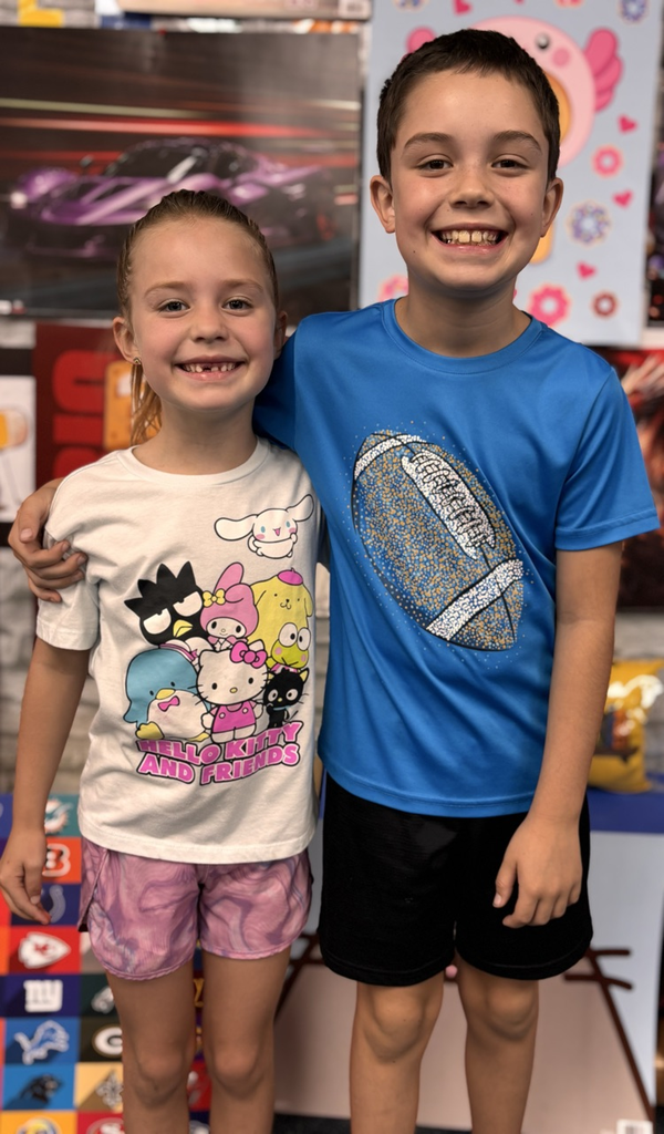 siblings at summer reading celebration 