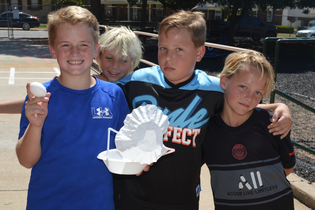 Fourth Graders celebrating a successful egg drop activity
