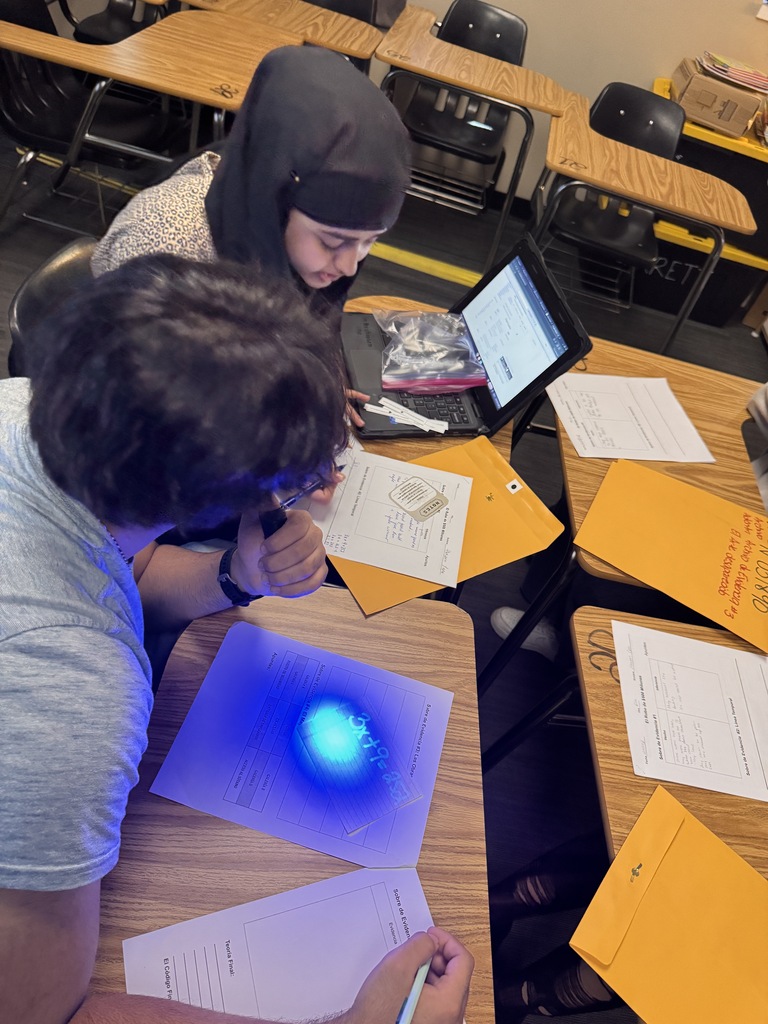 students working on a crime scene investigation lesson