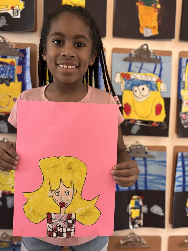 student with Dolly Parton portrait 